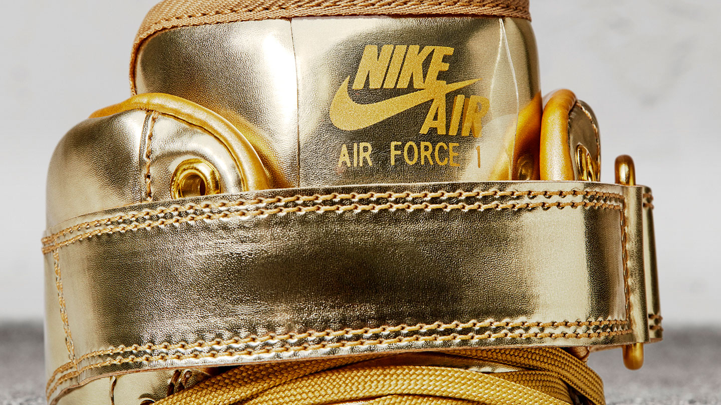 nike air force 1 high gold logo