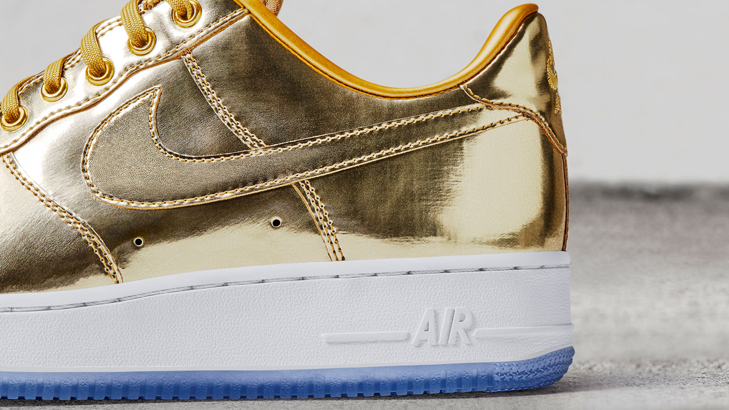 nike air force 1 low gold top