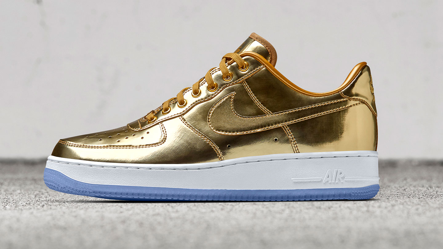 gold nike air force 1 low